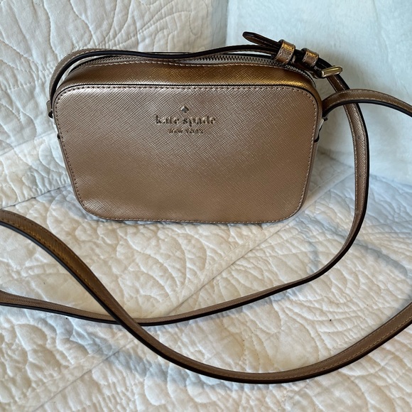 kate spade Handbags - Kate Spade EUC Gold Crossbody Bag